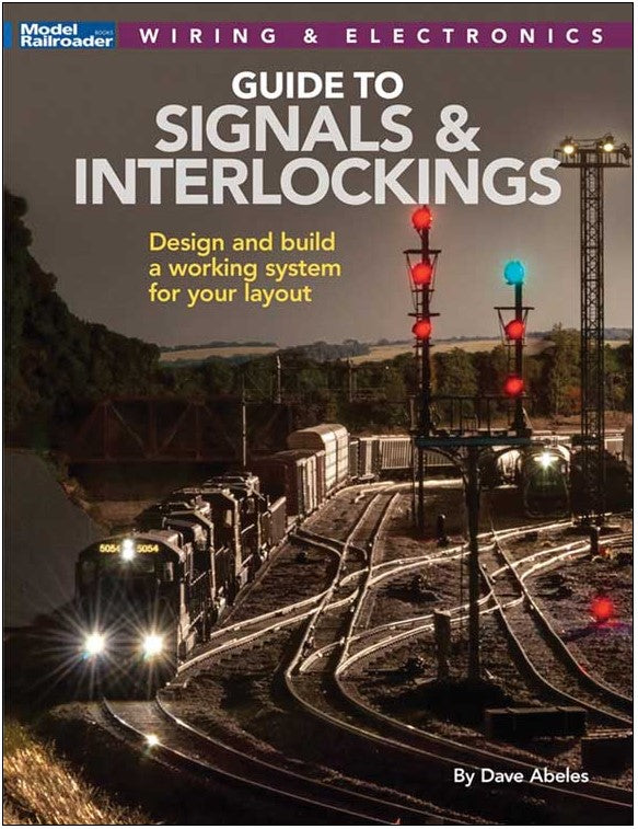 Book cover of 'Guide to Signals & Interlockings' with train and signal lights on a railway track.