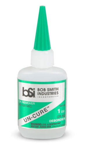 Bob Smith Industries UN-CURE CA REMOVER bottle with green cap on a white background